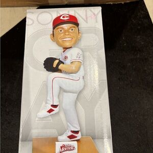 White and Red Bobblehead by